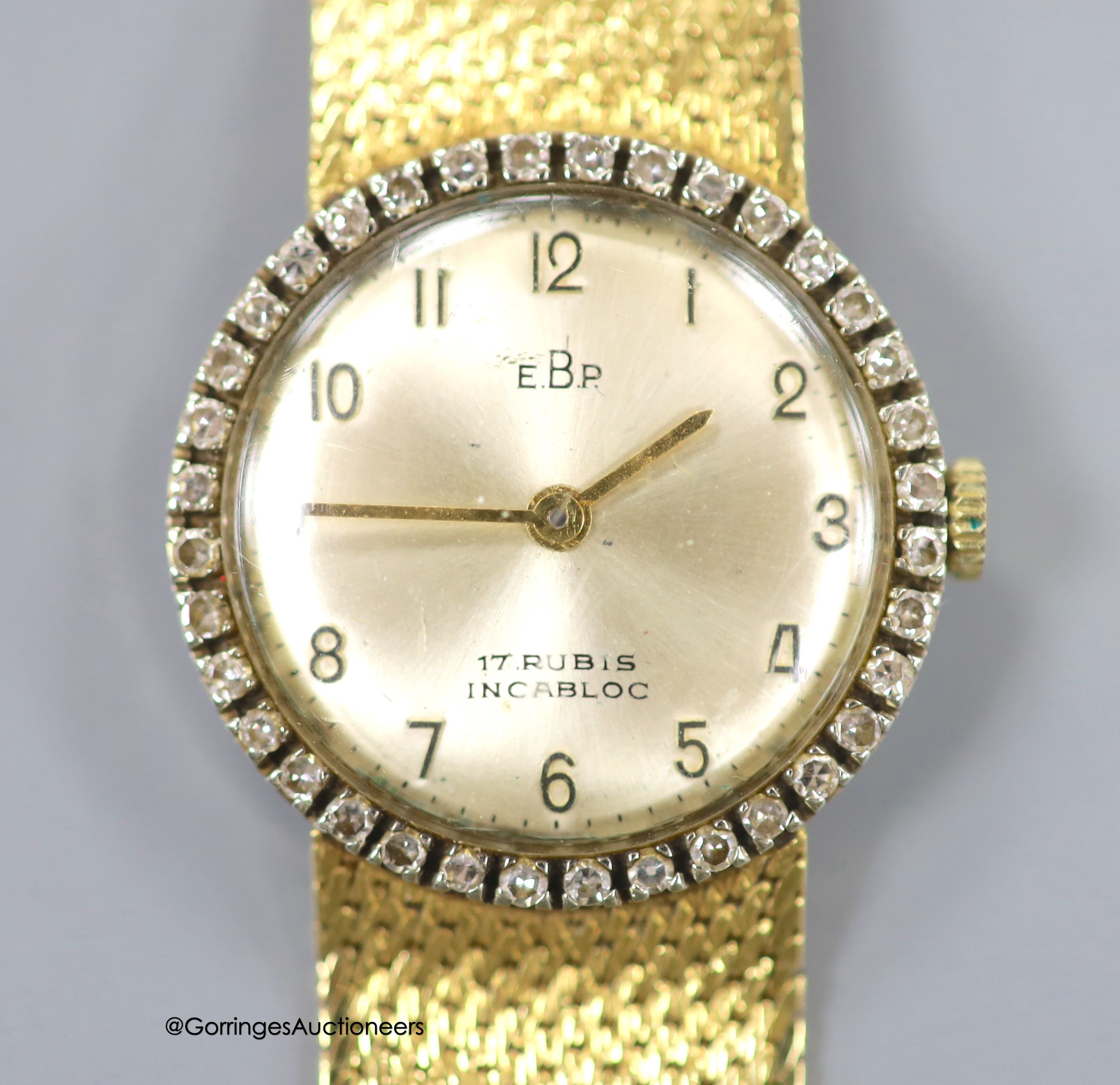A lady's 18k and diamond set EBP manual wind wrist watch on an integral 750 mesh link bracelet, overall 19.5cm, gross weight 46.3 grams